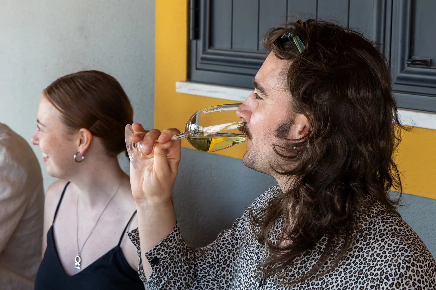 Guest enjoying a Portuguese wine tasting experience.